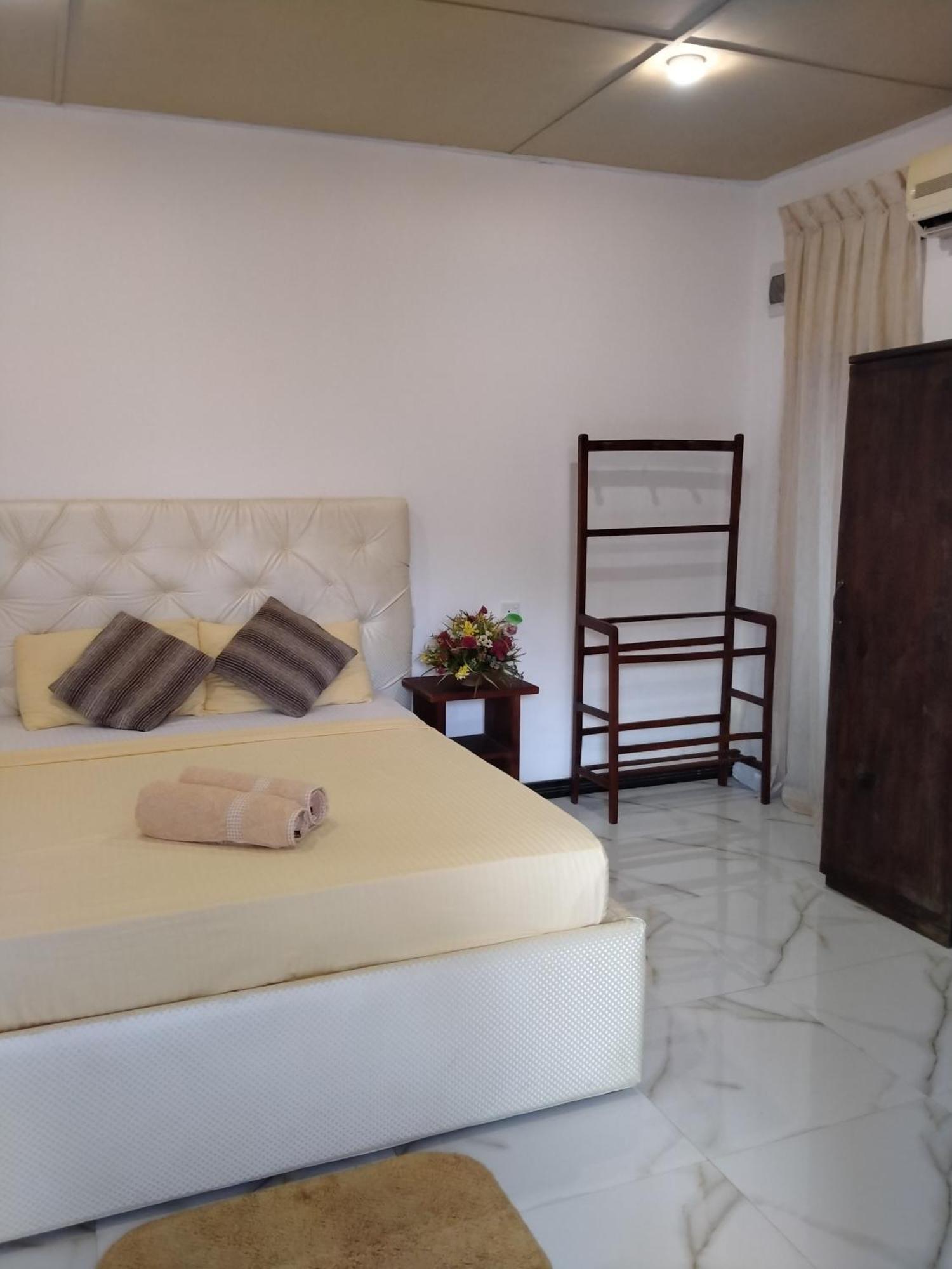 נגומבו Living Home חדר תמונה