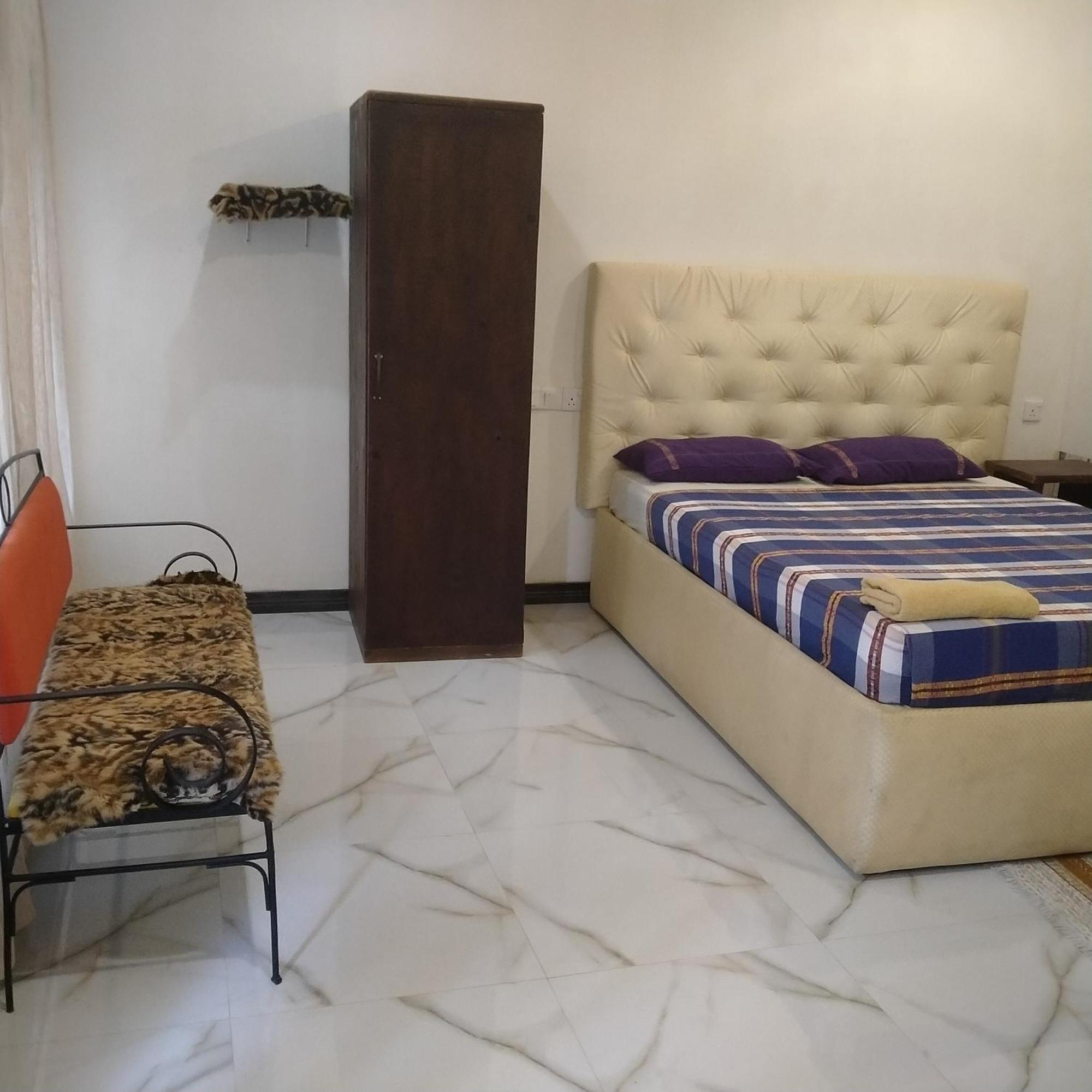 נגומבו Living Home חדר תמונה