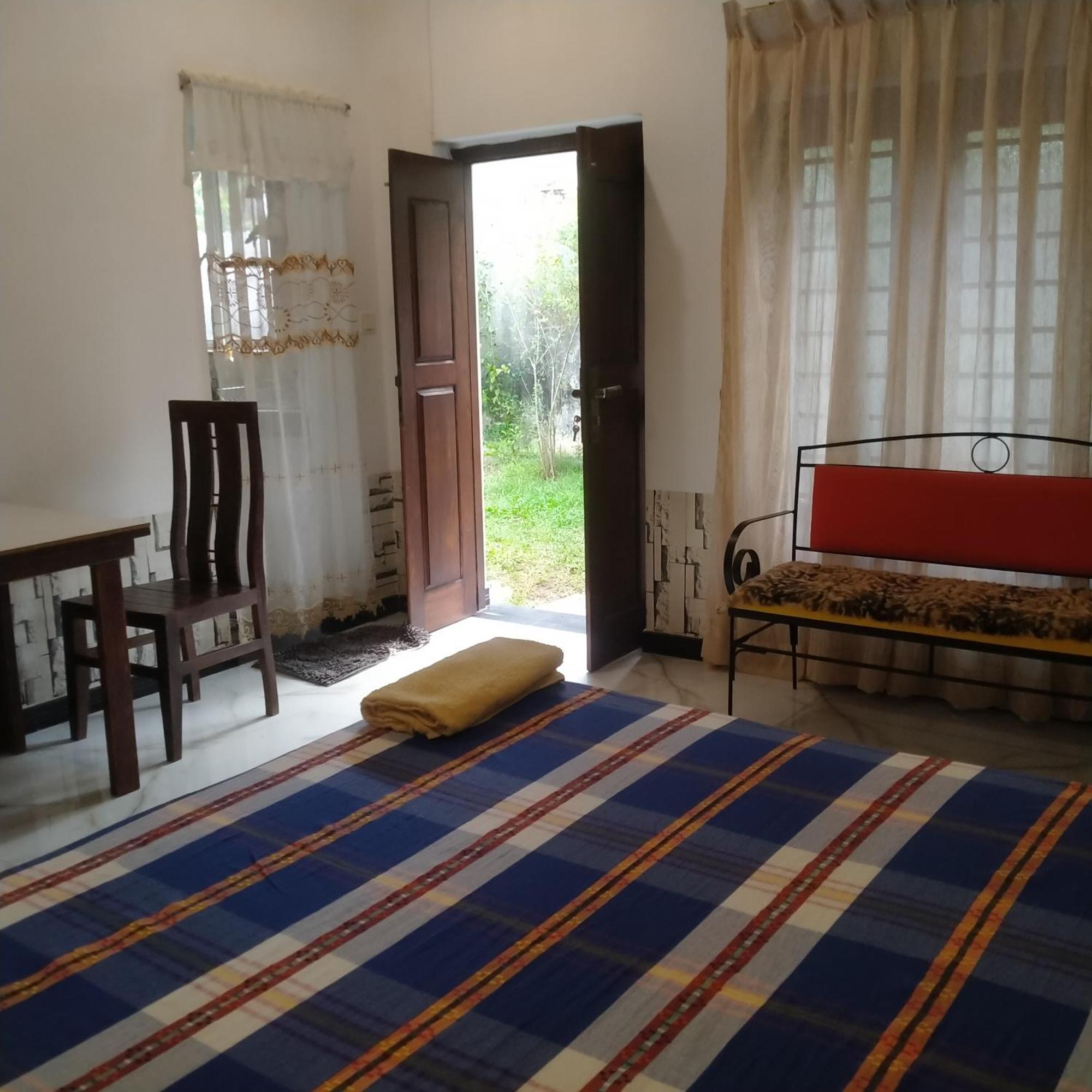 נגומבו Living Home חדר תמונה