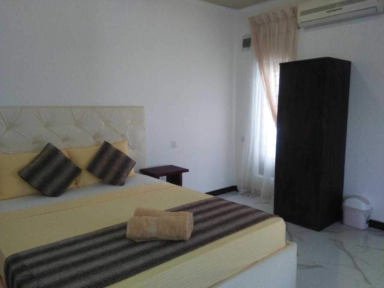 נגומבו Living Home חדר תמונה
