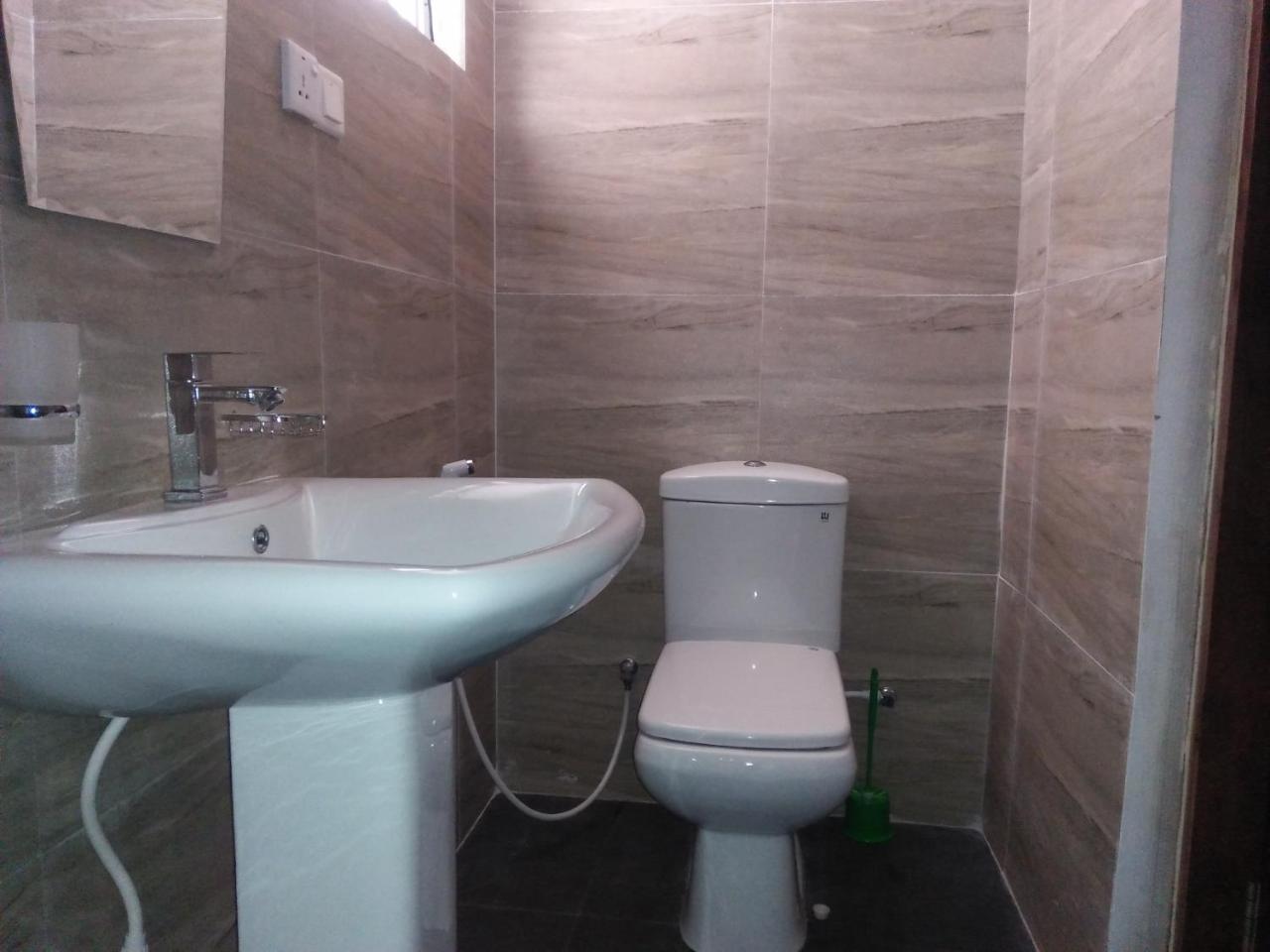 נגומבו Living Home חדר תמונה