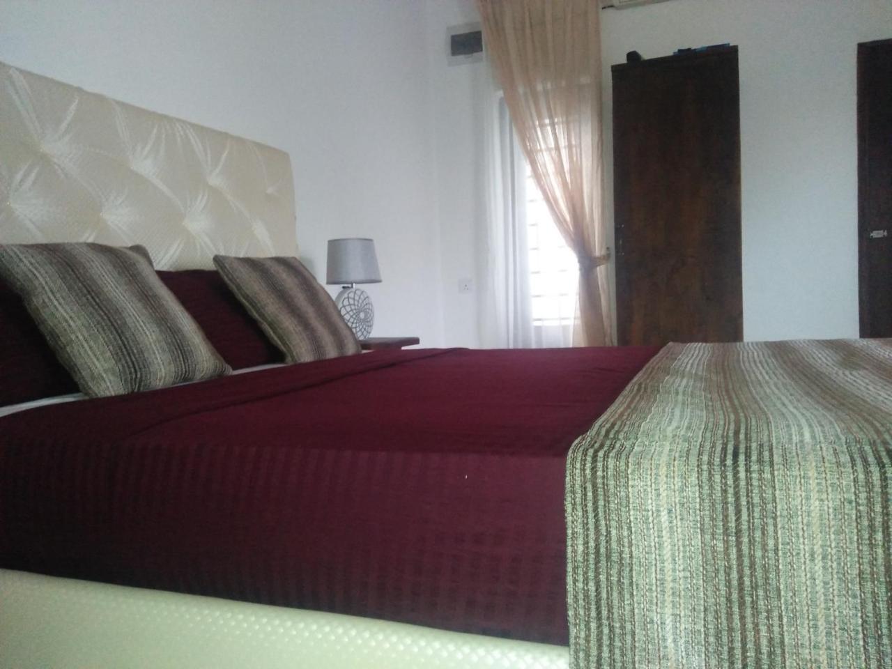 נגומבו Living Home חדר תמונה